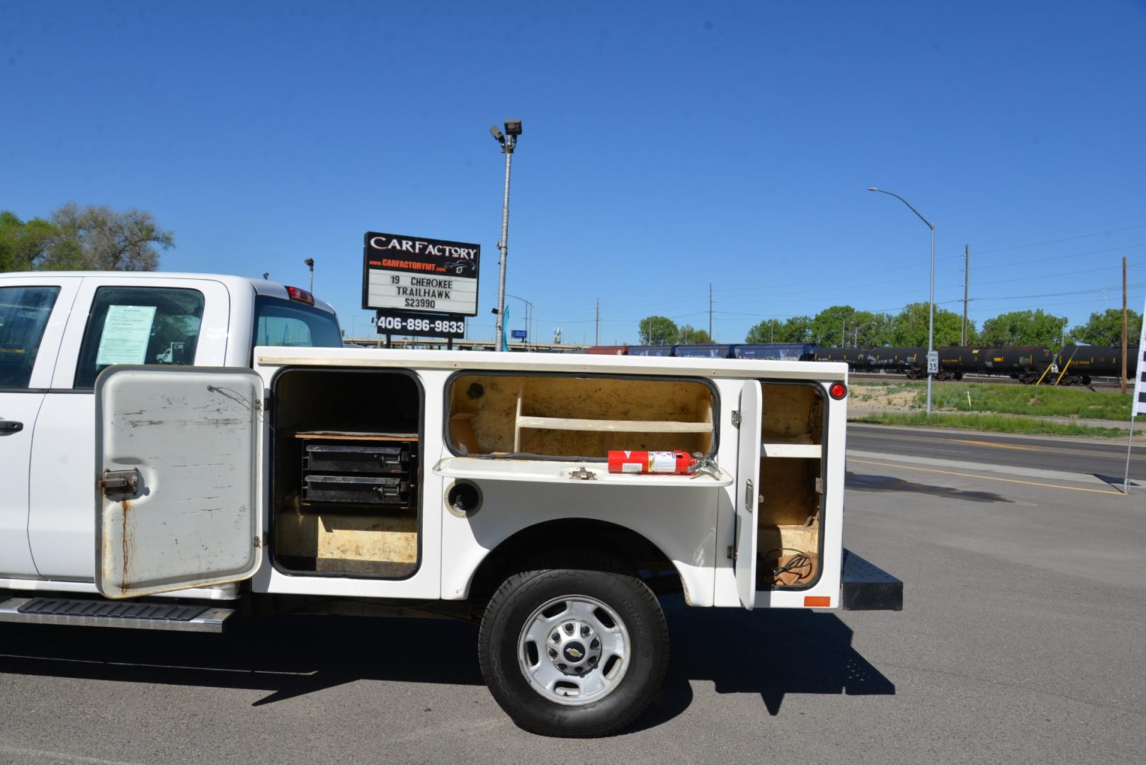 2015 White /Gray Chevrolet Silverado 2500HD Service Body Double Cab 4WD (1GB2KUEG6FZ) with an 6.0 Gasoline V8 engine, Automatic transmission, located at 4562 State Avenue, Billings, MT, 59101, (406) 896-9833, 45.769516, -108.526772 - 2015 Chevrolet Silverado 2500HD Double Cab 4WD Service Body - Montana one owner! Stock # - 23260 - Vin # - 1GB2KUEG6FZ114044 - 143,352 miles - Fibre Body Fiberglass service body 6.0L V8 OHV 16V FFV Gasoline Engine - 6-Speed Automatic Transmission - 4WD - 143,352 miles - One owner - Inspected a - Photo#6